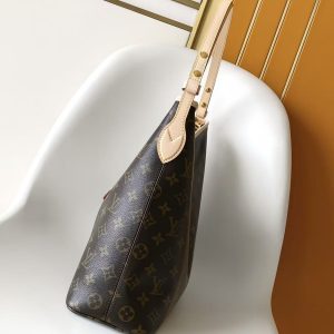 Alternative view of p700L Series $122,890.00 M27335 Vintage-Printed Monogram Canvas To commemorate the 130th anniversary of the Louis Vuitton Monogram emblem, this anniversary edition Lineup bag offers vibrant options for work and weekend getaways.Crafted from vibrant V Monogram canvas, it features bow accents and a celebratory slogan tag with metal rivets complementing the gold-tone hardware. Inside, a dedicated leather label commemorates this special moment. Dimensions: 13.6 x 10.2 x 5.1 inches (L x H x W).Multi-color/white coated canvas exterior. 1 interior celebratory leather label. Leather trim. 1 interior flat pocket. Microfiber lining. Holds: 14" laptop, zippered wallet, books, tablet, 6.7" smartphone, 1 front zippered pocket for sunglasses, keys, lipstick.